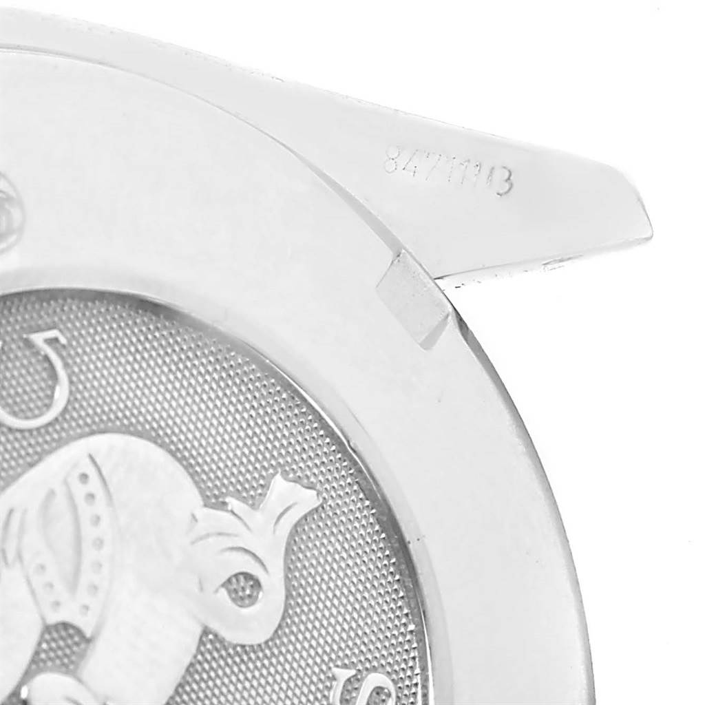 This image shows a close-up of the back case and lugs of an Omega Speedmaster 3220.50.00 Men
s Stainless Steel Black Dial 3220.50.00 Men
s Stainless Steel Black Dial watch.