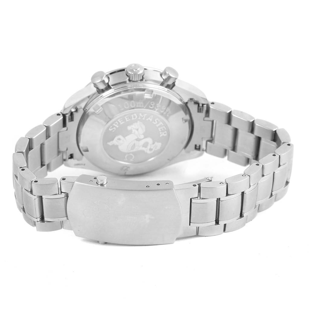 The image shows the back of the Omega Speedmaster 3212.80.00 Men
s Stainless Steel Blue Dial 3212.80.00 Men
s Stainless Steel Blue Dial watch, highlighting the engraved case back and metal bracelet.