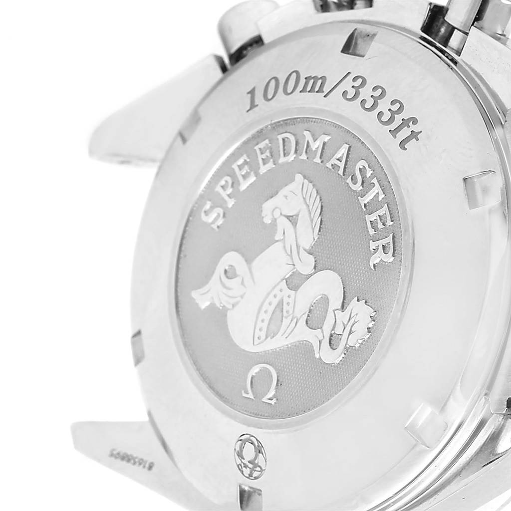 The image shows the backside case of an Omega Speedmaster 3212.80.00 Men
s Stainless Steel Blue Dial 3212.80.00 Men
s Stainless Steel Blue Dial watch, highlighting its water resistance rating and emblem.