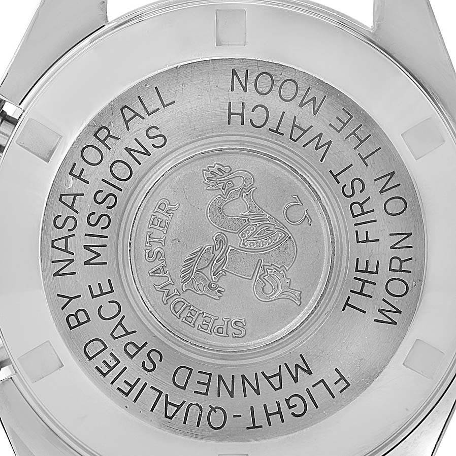 The image shows the case back of an Omega Speedmaster 3570.50.00 Men's Stainless Steel Black Dial 3570.50.00 Men's Stainless Steel Black Dial watch, highlighting the engraved insignia and text detailing its NASA certification.