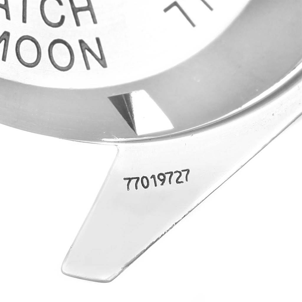 This image shows a close-up of the case back of an Omega Speedmaster 3570.50.00 Men's Stainless Steel Black Dial 3570.50.00 Men's Stainless Steel Black Dial watch, including part of the text and serial number.