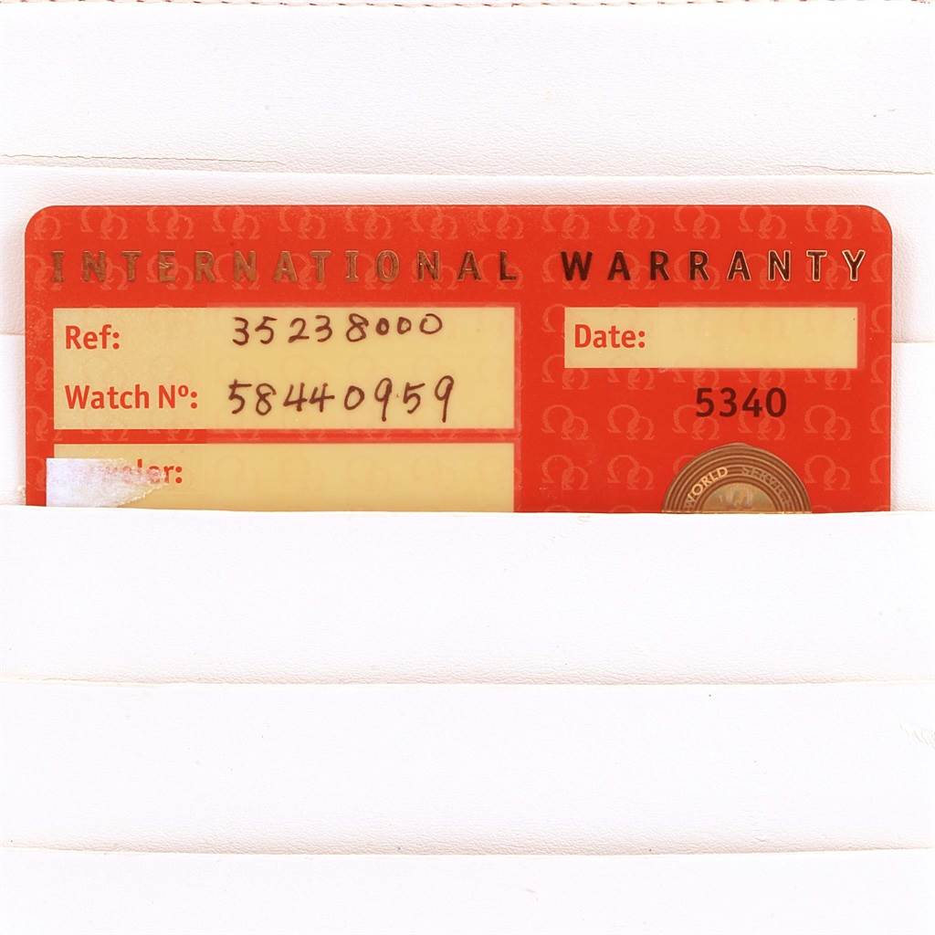 This image shows an Omega Speedmaster 3523.80.00 Men's Stainless Steel Blue Dial 3523.80.00 Men's Stainless Steel Blue Dial International Warranty card placed inside a white envelope.