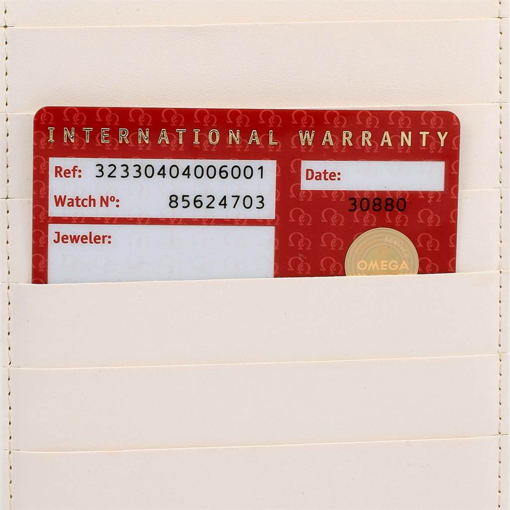 The image shows the international warranty card for an Omega Speedmaster 323.30.40.40.06.001 Men's Stainless Steel Grey Dial 323.30.40.40.06.001 Men's Stainless Steel Grey Dial watch.