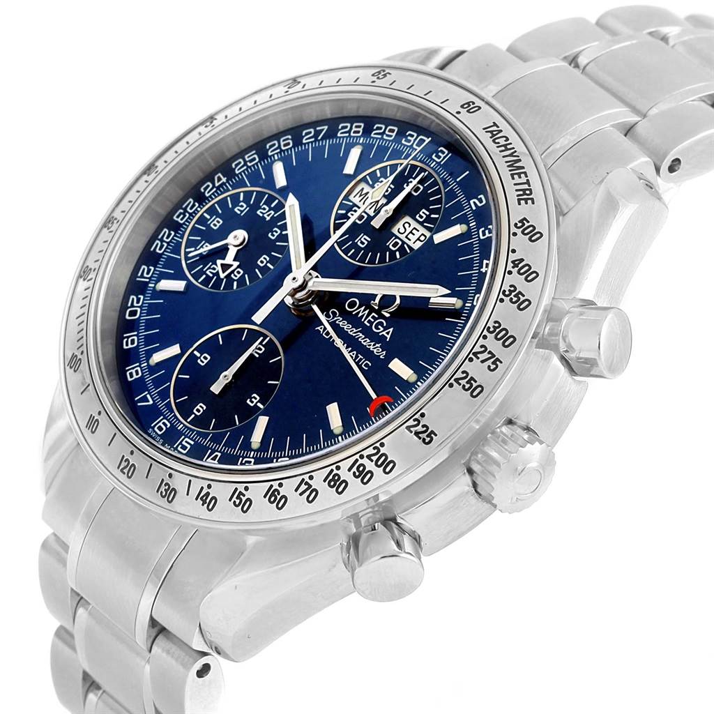 The image shows a side angle of the Omega Speedmaster 3523.80.00 Men
s Stainless Steel Blue Dial 3523.80.00 Men
s Stainless Steel Blue Dial watch, highlighting its dial, bezel, and chronograph pushers.