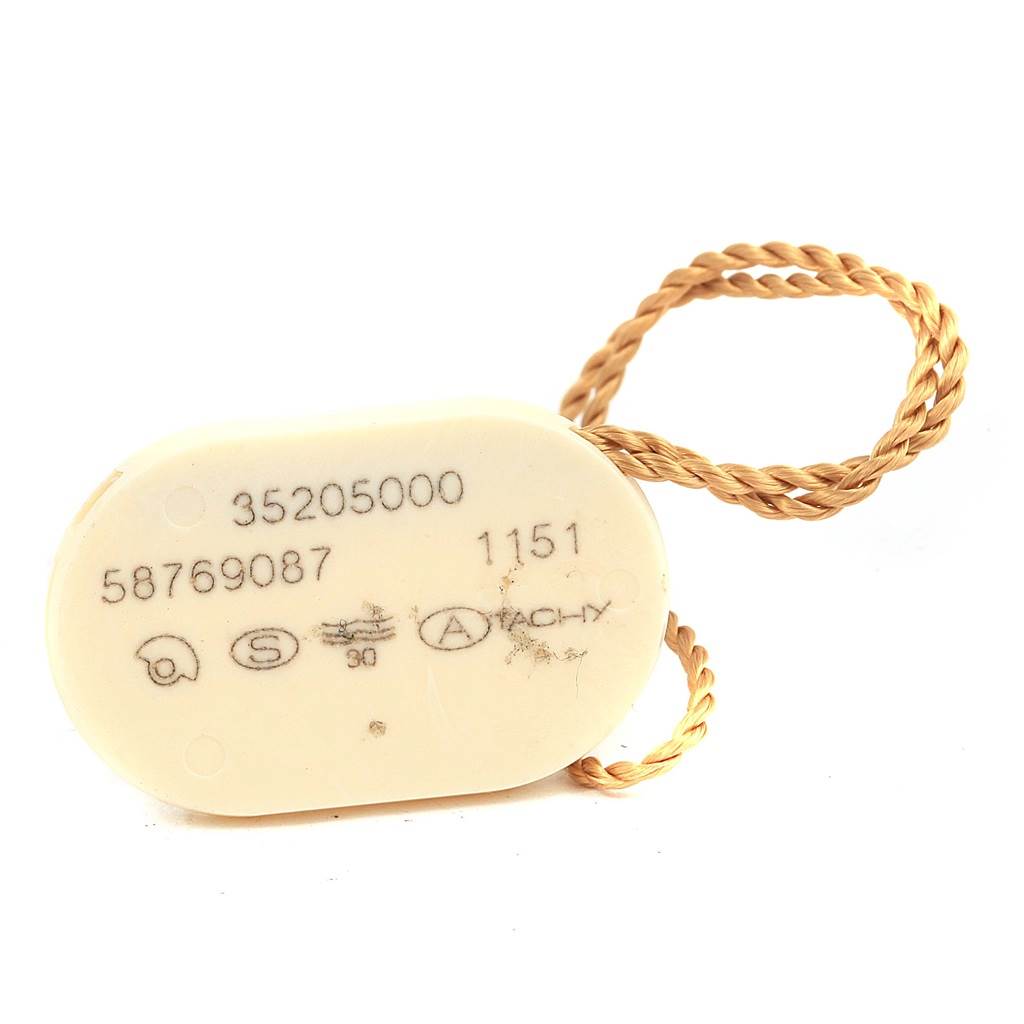 The image shows the hang tag of an Omega Speedmaster 3520.50.00 Men
s Stainless Steel Black Dial 3520.50.00 Men
s Stainless Steel Black Dial watch, seen from a top angle.