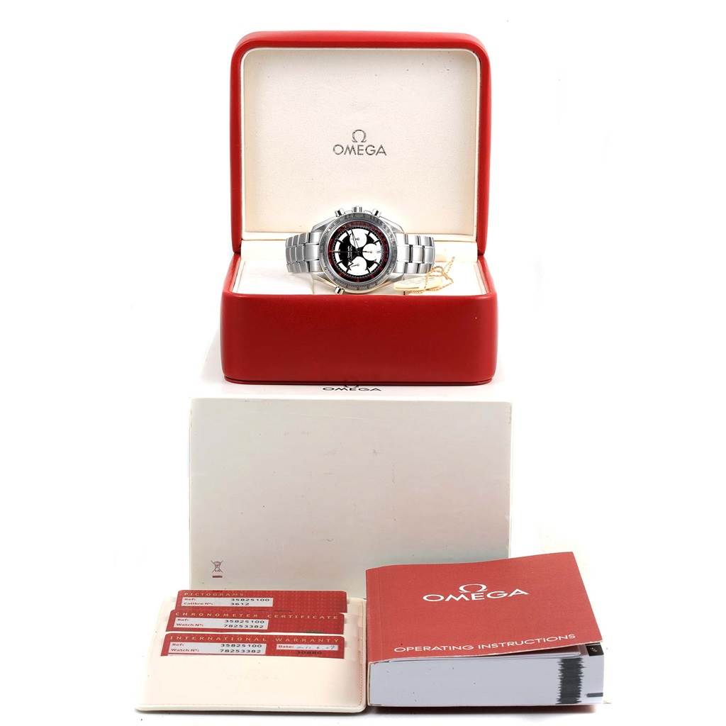 The Omega Speedmaster 3582.51.00 Men's Stainless Steel Black Dial 3582.51.00 Men's Stainless Steel Black Dial watch is displayed in an open box with operating instructions and warranty cards shown beside it.