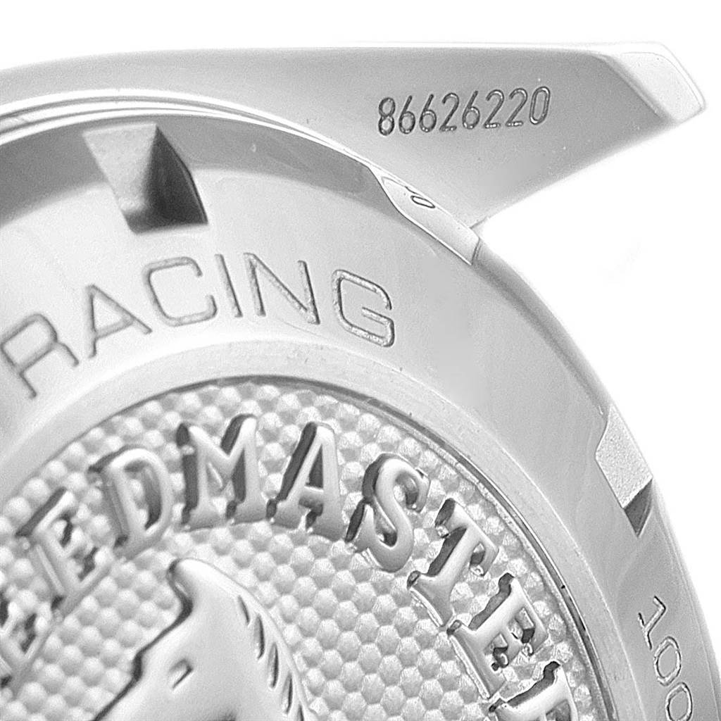 The image shows a close-up of the case back of an Omega Speedmaster 326.30.40.50.06.001 Men
s Stainless Steel Grey Dial 326.30.40.50.06.001 Men
s Stainless Steel Grey Dial Racing watch, highlighting the logo and engraved model number.