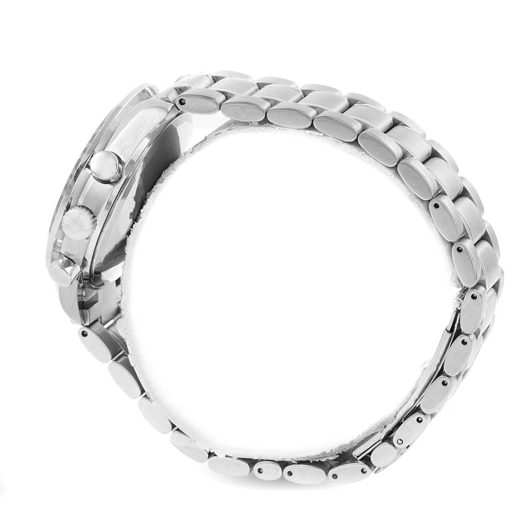 The image shows a side profile of an Omega Speedmaster 3520.50.00 Men
s Stainless Steel Black Dial 3520.50.00 Men
s Stainless Steel Black Dial watch, focusing on its metallic bracelet and crown side.