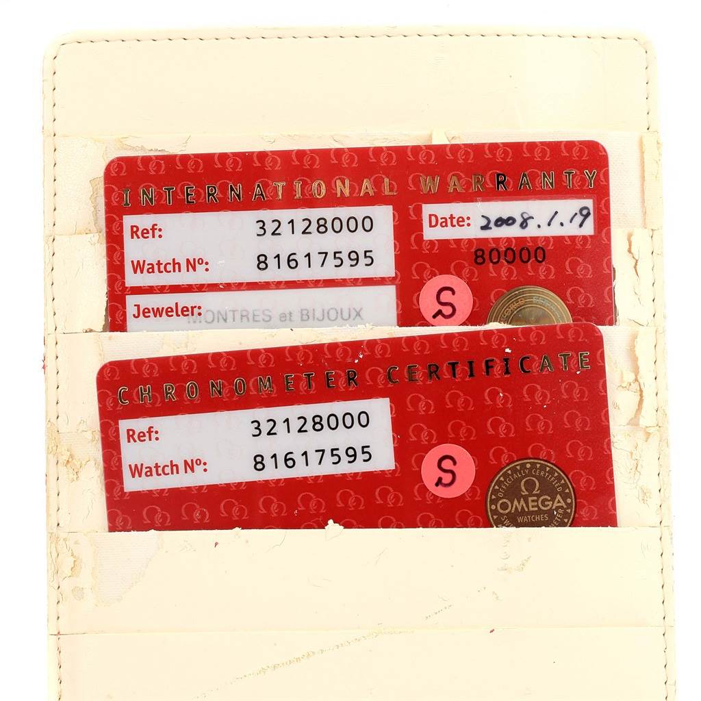 The image shows the warranty and certificate cards for the Omega Speedmaster 3212.80.00 Men
s Stainless Steel Blue Dial 3212.80.00 Men
s Stainless Steel Blue Dial watch.