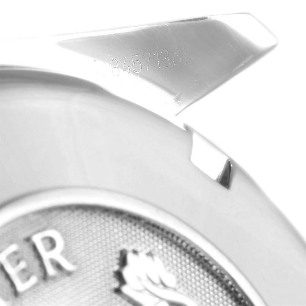 This image shows the case back with partial engraving of the Omega Speedmaster 3222.80.00 Men
s Stainless Steel Blue Dial 3222.80.00 Men
s Stainless Steel Blue Dial watch at a close-up angle.