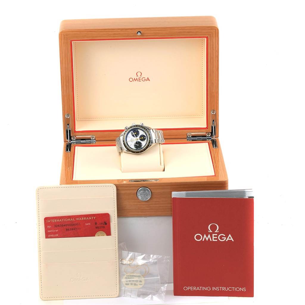 The angled image displays the Omega Speedmaster 326.30.40.50.04.001 Men
s Stainless Steel White Dial 326.30.40.50.04.001 Men
s Stainless Steel White Dial watch in its box, along with the warranty card, manual, and accessory bags.