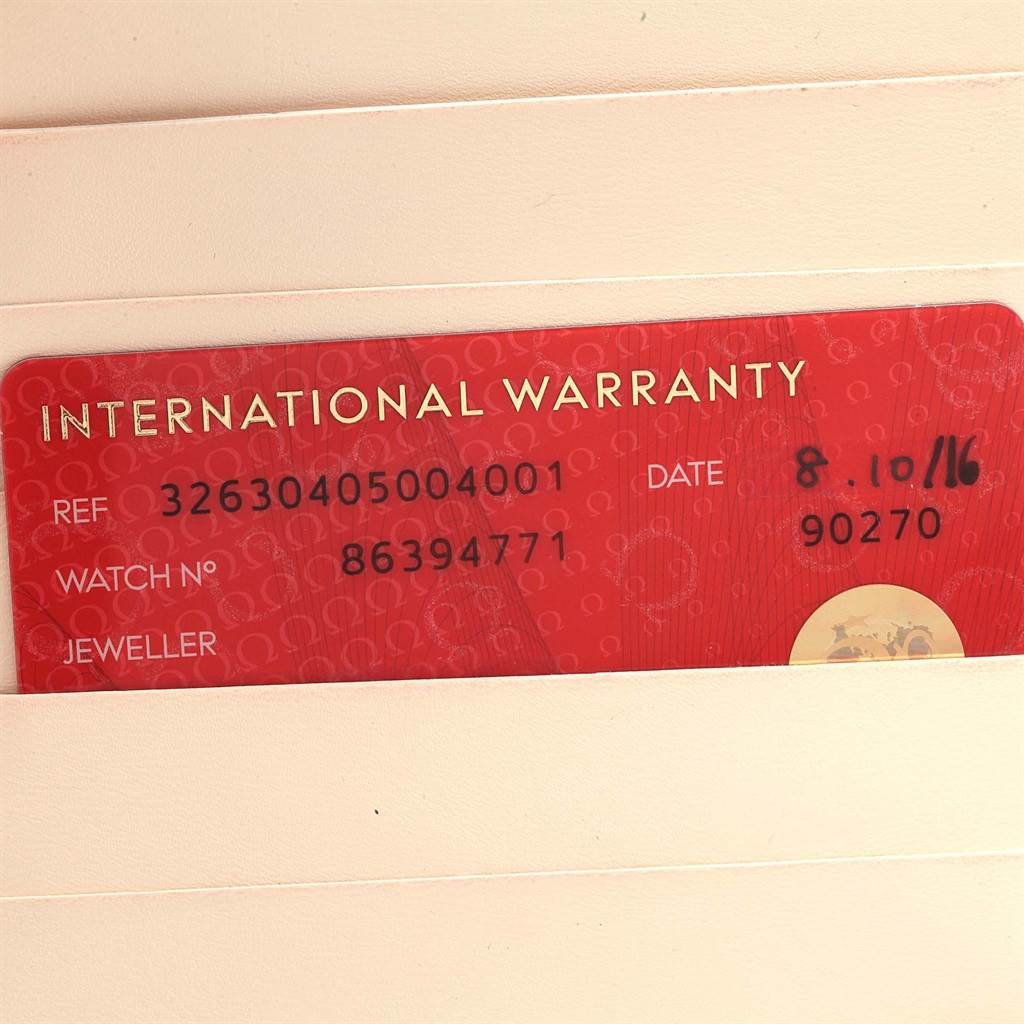 The image shows the international warranty card of an Omega Speedmaster 326.30.40.50.04.001 Men
s Stainless Steel White Dial 326.30.40.50.04.001 Men
s Stainless Steel White Dial watch, part of its packaging.