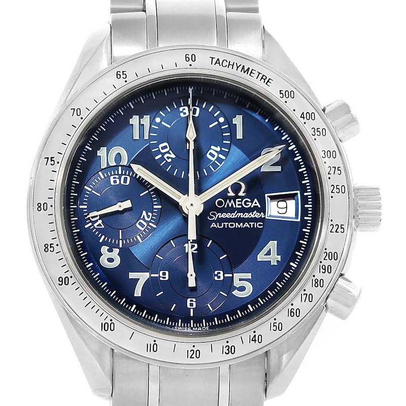 This image shows a front view of an Omega Speedmaster watch, highlighting its blue dial, subdials, and tachymeter bezel.