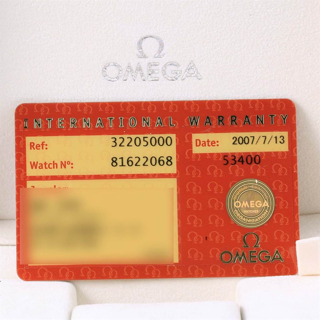 The image shows an international warranty card for the Omega Speedmaster 3220.50.00 Men
s Stainless Steel Black Dial 3220.50.00 Men
s Stainless Steel Black Dial watch model, featuring details like reference and watch number.