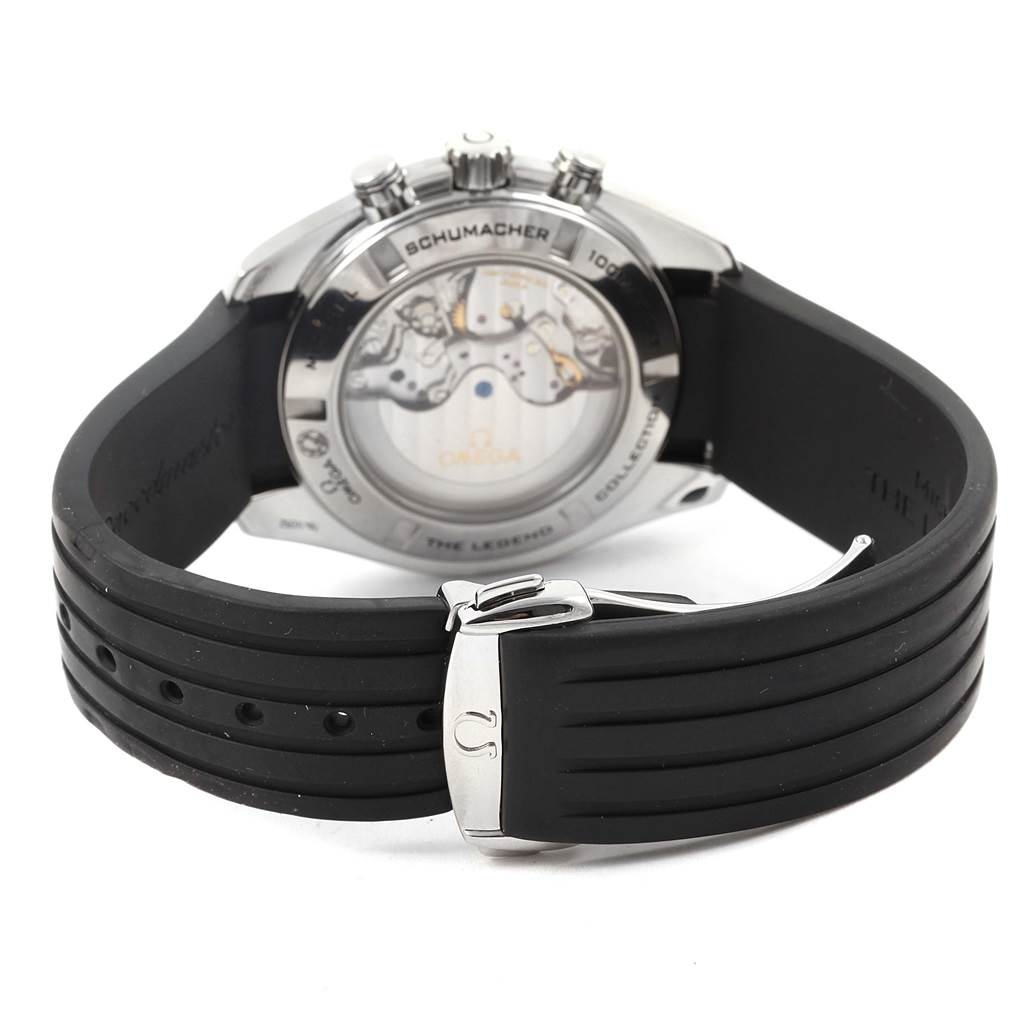 The image shows the back view of an Omega Speedmaster 321.32.44.50.01.001 Men
s Stainless Steel Black Dial 321.32.44.50.01.001 Men
s Stainless Steel Black Dial watch with a black rubber strap and exposed mechanical movement.