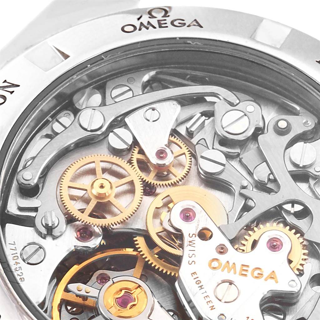This image shows the intricate movement mechanism of the Omega Speedmaster 3573.50.00 Men
s Stainless Steel Black Dial 3573.50.00 Men
s Stainless Steel Black Dial watch, highlighting the gears and inner components.