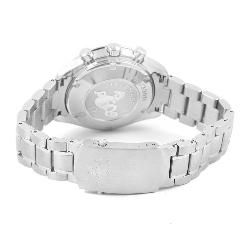 The image shows the back and clasp of an Omega Speedmaster 323.30.40.40.04.001 Men
s Stainless Steel White Dial 323.30.40.40.04.001 Men
s Stainless Steel White Dial watch, highlighting its bracelet and engraved case back.