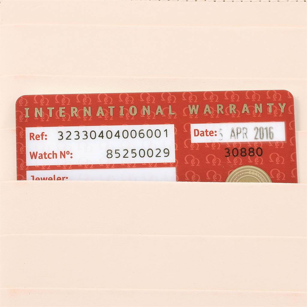 The image shows the international warranty card for an Omega Speedmaster 323.30.40.40.06.001 Men
s Stainless Steel Grey Dial 323.30.40.40.06.001 Men
s Stainless Steel Grey Dial watch.
