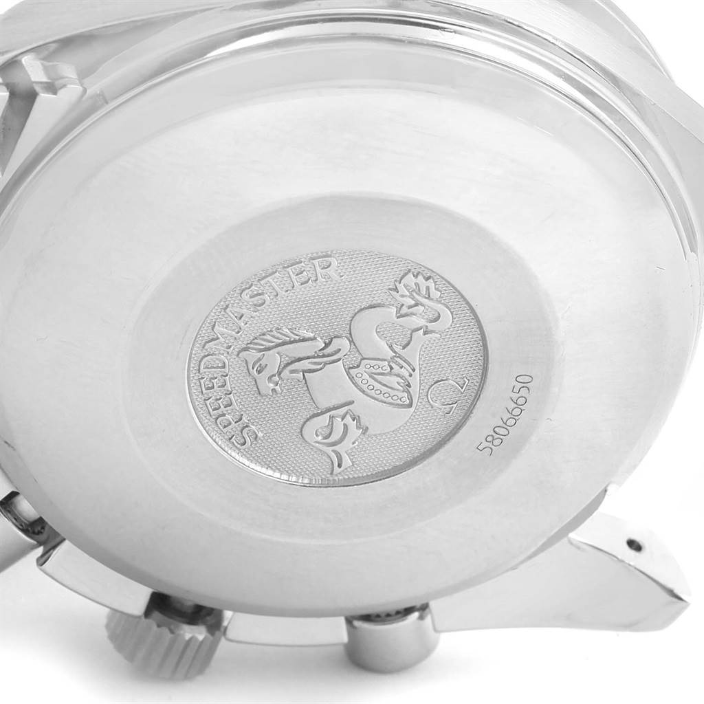 The image shows the case back of the Omega Speedmaster 3513.82.00 Men
s Stainless Steel Blue Dial 3513.82.00 Men
s Stainless Steel Blue Dial watch, featuring its engraved emblem and serial number.