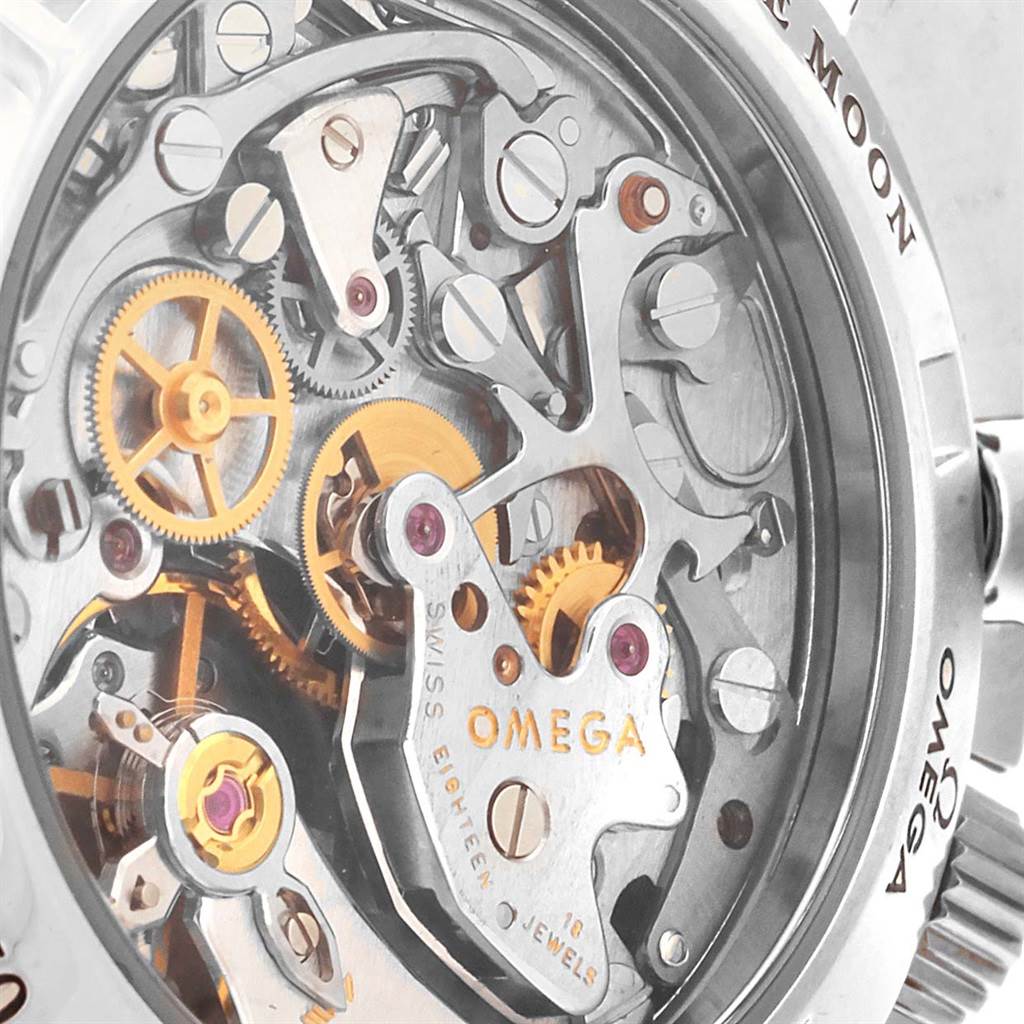 The image shows a close-up view of the intricate internal mechanics of the Omega Speedmaster 3576.50.00 Men
s Stainless Steel Black Dial 3576.50.00 Men
s Stainless Steel Black Dial watch, highlighting gears and jewels.