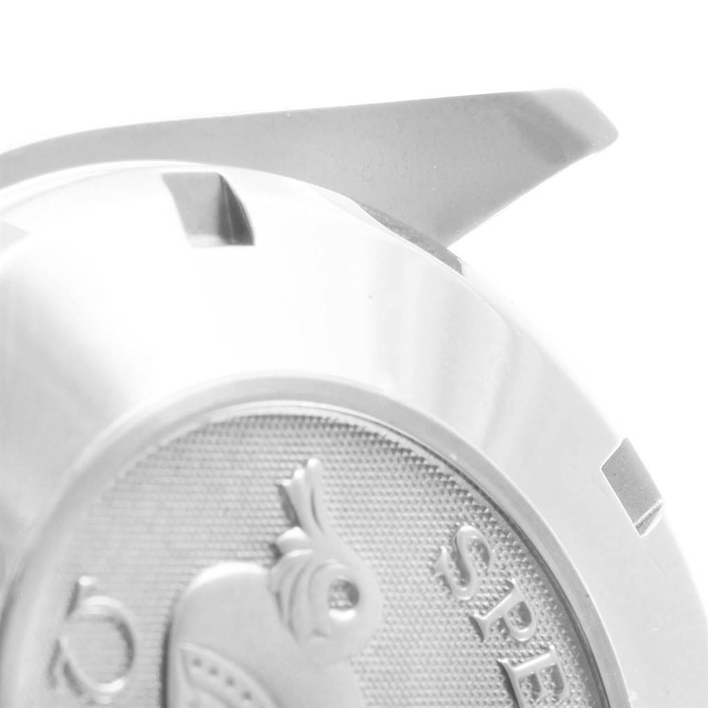 The image shows a close-up of the back casing and part of the lug of an Omega Speedmaster 323.30.40.40.06.001 Men
s Stainless Steel Grey Dial 323.30.40.40.06.001 Men
s Stainless Steel Grey Dial watch.