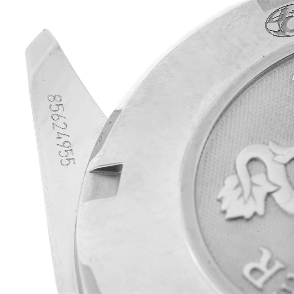 This image shows a close-up of the case back and serial number of the Omega Speedmaster 323.30.40.40.06.001 Men
s Stainless Steel Grey Dial 323.30.40.40.06.001 Men
s Stainless Steel Grey Dial watch.