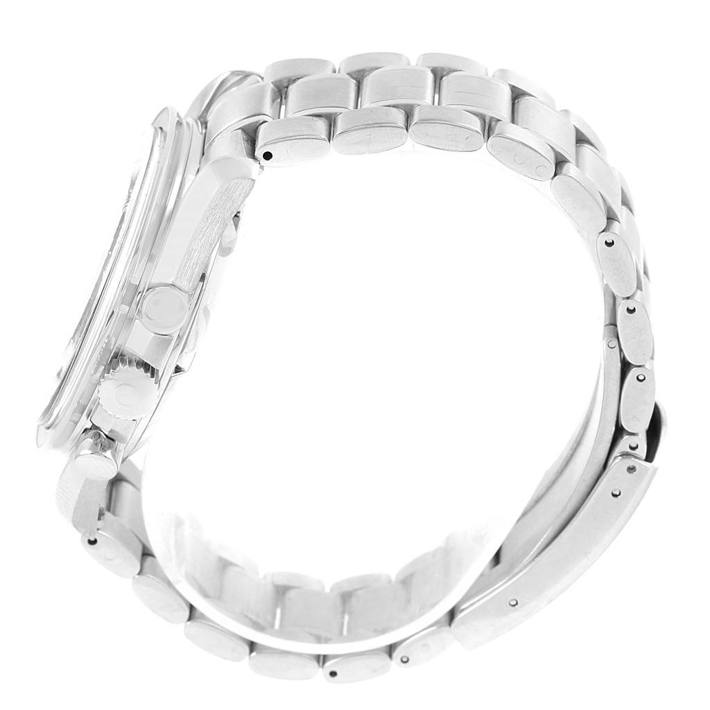 The image shows a side view of the Omega Speedmaster 3570.50.00 Men
s Stainless Steel Black Dial 3570.50.00 Men
s Stainless Steel Black Dial watch, focusing on its bracelet, clasp, and chronograph pushers.