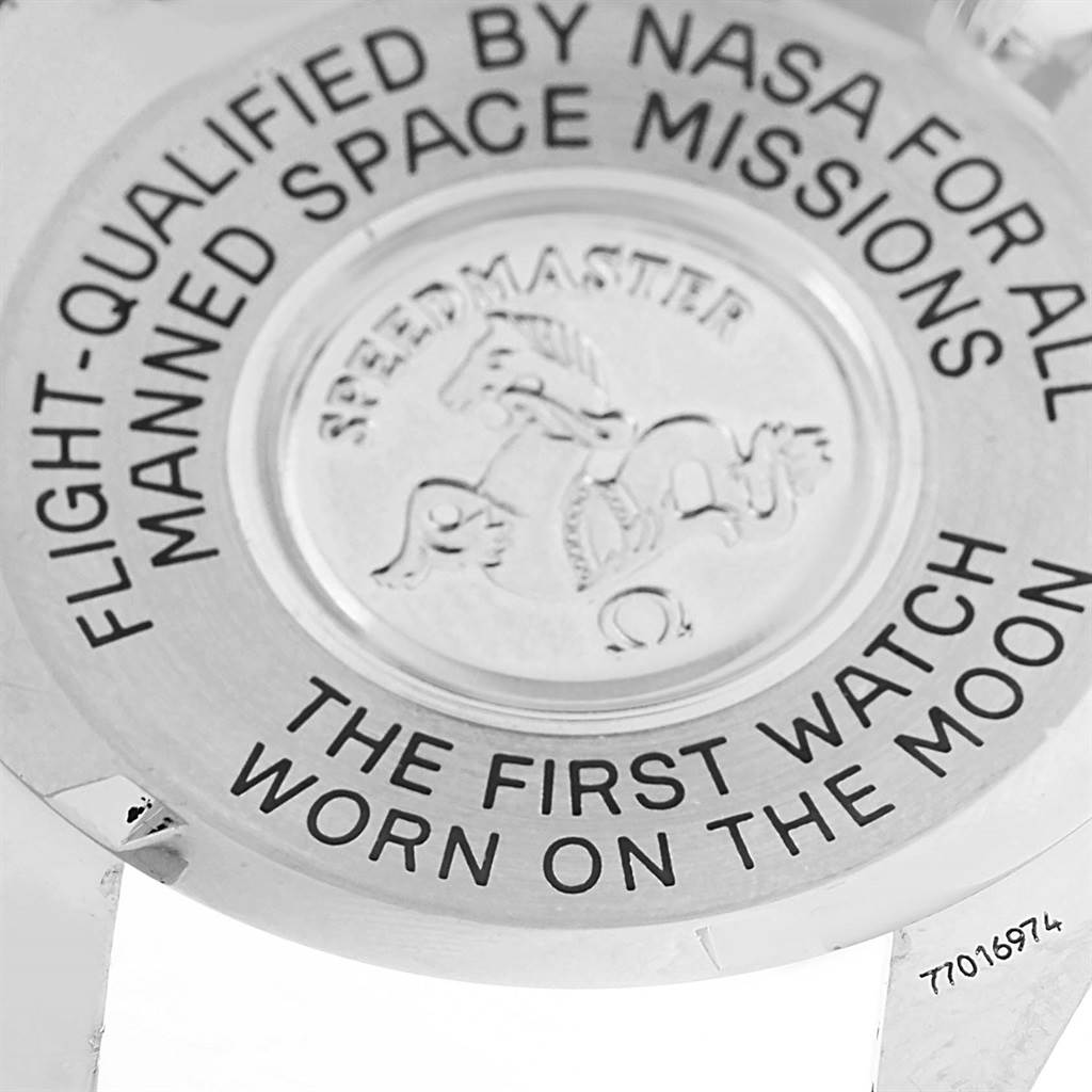 The image shows the back case of an Omega Speedmaster 3570.50.00 Men
s Stainless Steel Black Dial 3570.50.00 Men
s Stainless Steel Black Dial watch, highlighting its engraving and serial number.