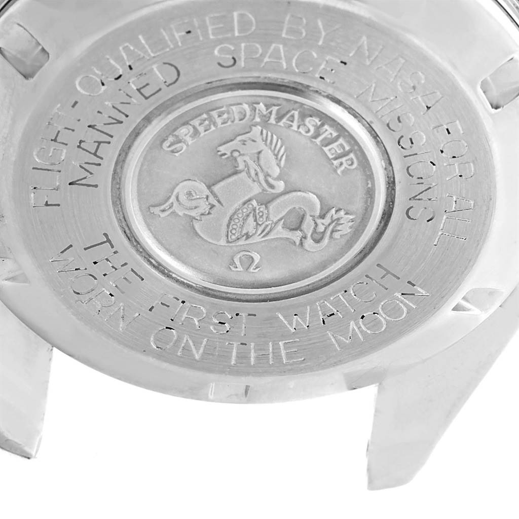 The image shows the back case of the Omega Speedmaster Men
s Stainless Steel Black Dial Men
s Stainless Steel Black Dial watch, highlighting its engraving and design.