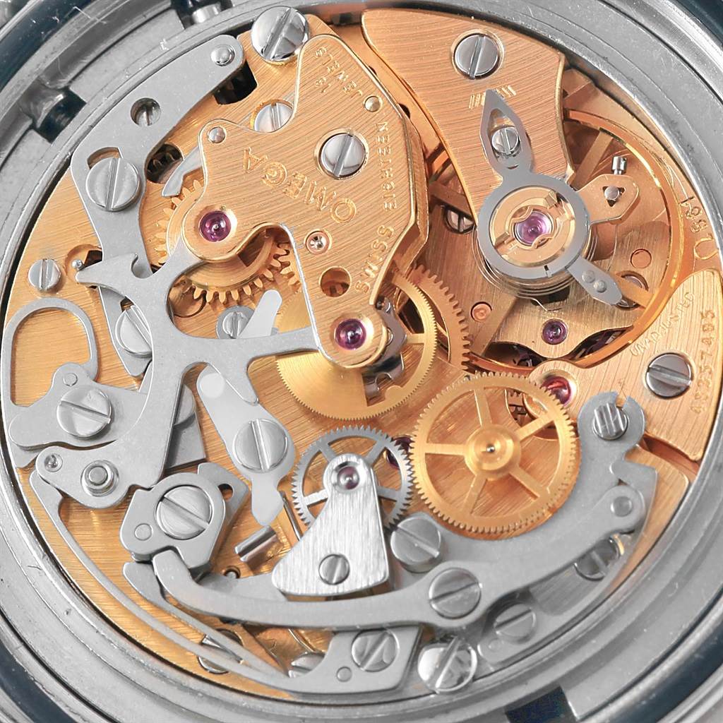 This is a close-up view of the Omega Speedmaster Men
s Stainless Steel Silver Dial Men
s Stainless Steel Silver Dial
s internal mechanical movement with various gears and components visible.