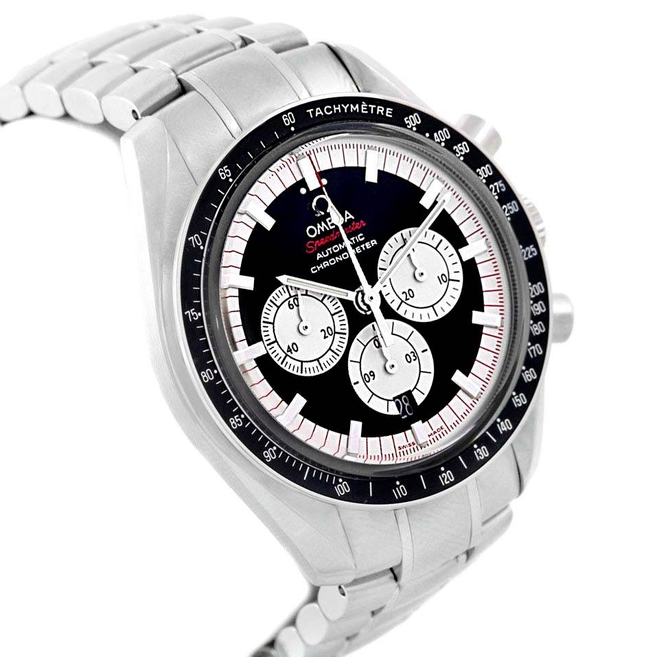 The image shows an angled view of an Omega Speedmaster 3507.51.00 Men
s Stainless Steel Black Dial 3507.51.00 Men
s Stainless Steel Black Dial watch highlighting the tachymeter bezel, chronograph subdials, and metal bracelet.