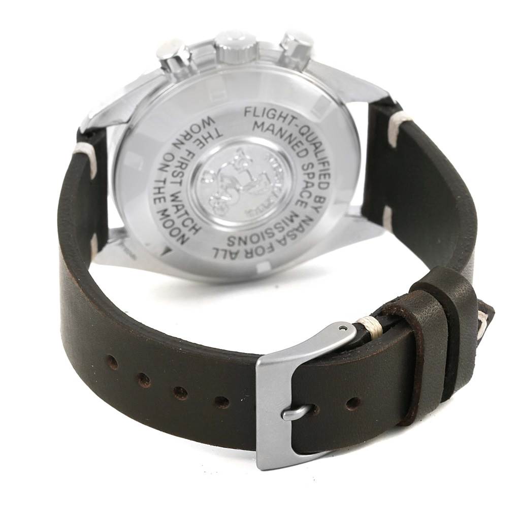 The image shows the back and clasp of an Omega Speedmaster Men
s Stainless Steel Black Dial Men
s Stainless Steel Black Dial watch with a dark leather strap.