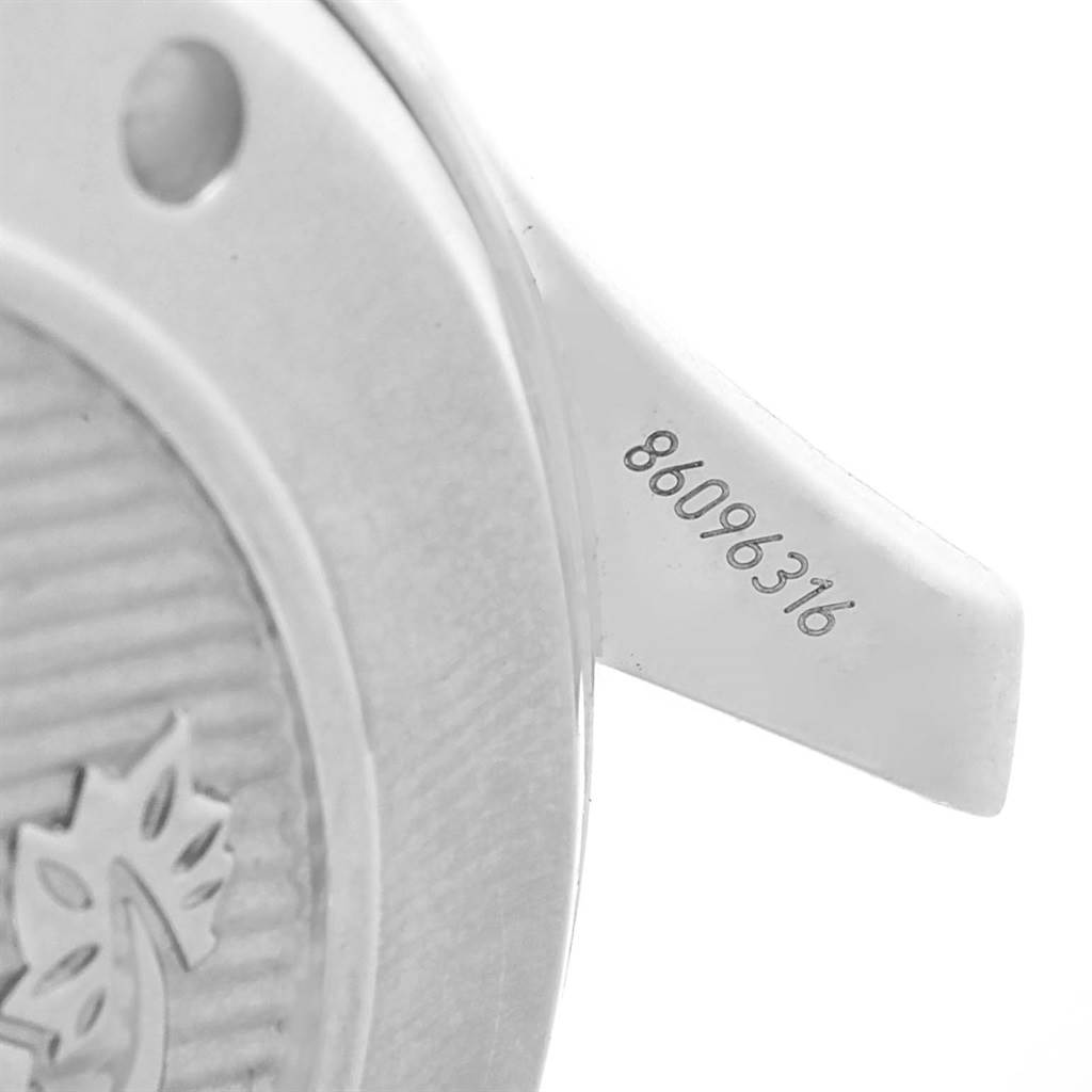 The image shows a close-up of the serial number on the case back and lug of an Omega Speedmaster 212.30.41.20.01.003 Men's Stainless Steel Black Dial 212.30.41.20.01.003 Men's Stainless Steel Black Dial watch.