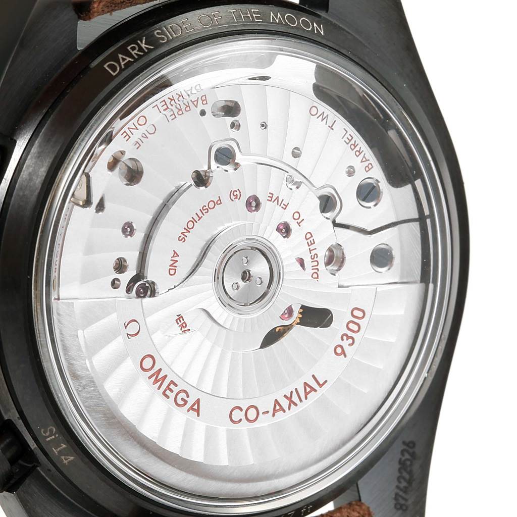 The image shows the back view of the Omega Speedmaster 311.92.44.51.01.006 Men
s Stainless Steel Black Dial 311.92.44.51.01.006 Men
s Stainless Steel Black Dial watch, highlighting the Co-Axial 9300 movement mechanism.