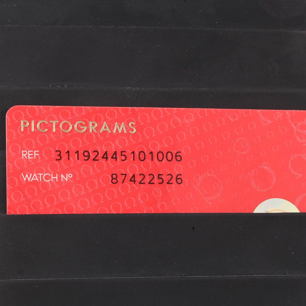 This image displays the reference and watch number of an Omega Speedmaster 311.92.44.51.01.006 Men
s Stainless Steel Black Dial 311.92.44.51.01.006 Men
s Stainless Steel Black Dial, shown on a red card labeled "PICTOGRAMS".
