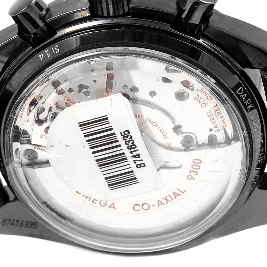 The image shows the back view of the Omega Speedmaster 311.92.44.51.01.004 Men
s Stainless Steel Black Dial 311.92.44.51.01.004 Men
s Stainless Steel Black Dial watch, showcasing its Co-Axial 9300 movement through a transparent case back.