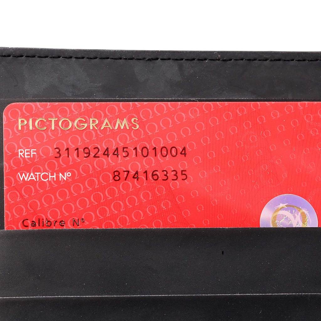The image shows the warranty card for an Omega Speedmaster 311.92.44.51.01.004 Men
s Stainless Steel Black Dial 311.92.44.51.01.004 Men
s Stainless Steel Black Dial watch with reference and watch numbers displayed.