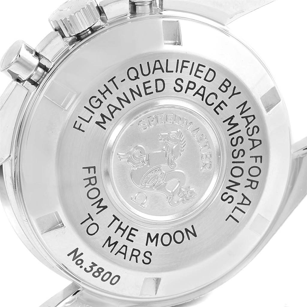 The image shows the back case of the Omega Speedmaster 3577.50.00 Men's Stainless Steel Black Dial 3577.50.00 Men's Stainless Steel Black Dial watch, highlighting the engraving and crown controls.