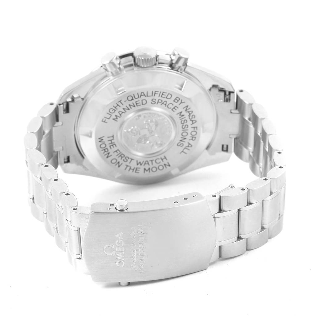 This image shows the backside and bracelet of an Omega Speedmaster 3575.20.00 Men's Stainless Steel White Dial 3575.20.00 Men's Stainless Steel White Dial watch, highlighting the case back engraving and the clasp.