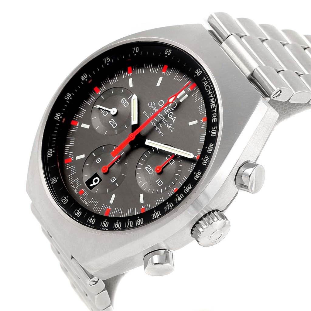 The image shows an angle of the Omega Speedmaster 327.10.43.50.06.001 Men
s Stainless Steel Grey Dial 327.10.43.50.06.001 Men
s Stainless Steel Grey Dial watch featuring the dial, tachymeter bezel, crown, pushers, and part of the metal bracelet.