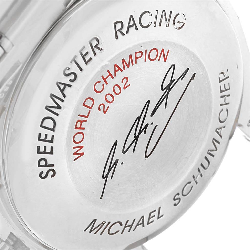 This image shows the back case of an Omega Speedmaster 3529.50.00 Men's Stainless Steel Black Dial 3529.50.00 Men's Stainless Steel Black Dial Racing watch, celebrating Michael Schumacher's 2002 championship.
