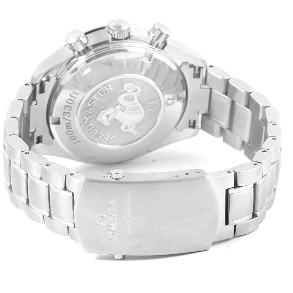 The image shows the back view and clasp of an Omega Speedmaster 323.30.40.40.04.001 Men's Stainless Steel White Dial 323.30.40.40.04.001 Men's Stainless Steel White Dial watch with its stainless steel bracelet and engraved case back.