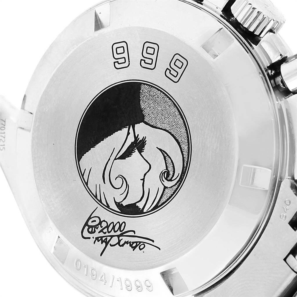 The image shows the back casing of an Omega Speedmaster 3571.50.00 Men's Stainless Steel Black Dial 3571.50.00 Men's Stainless Steel Black Dial watch, engraved with a unique design and the number 999.