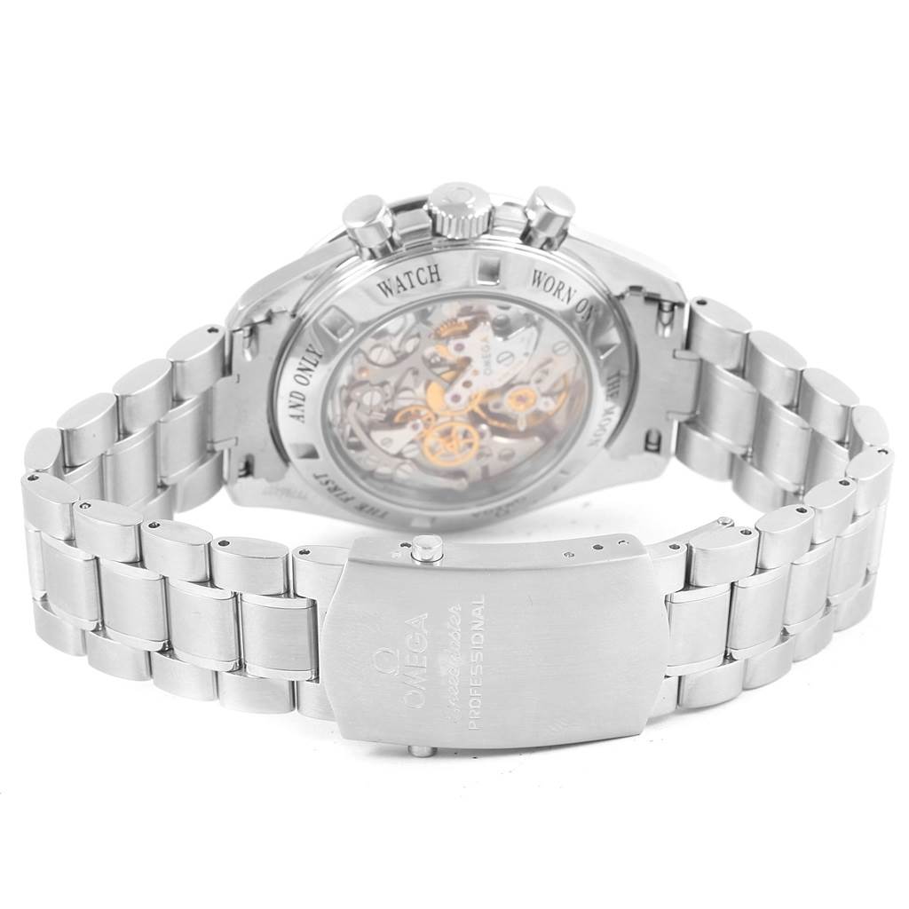 The image shows the back view of an Omega Speedmaster 311.30.42.30.13.001 Men's Stainless Steel Brown Dial 311.30.42.30.13.001 Men's Stainless Steel Brown Dial watch, highlighting its transparent case back and metal bracelet.