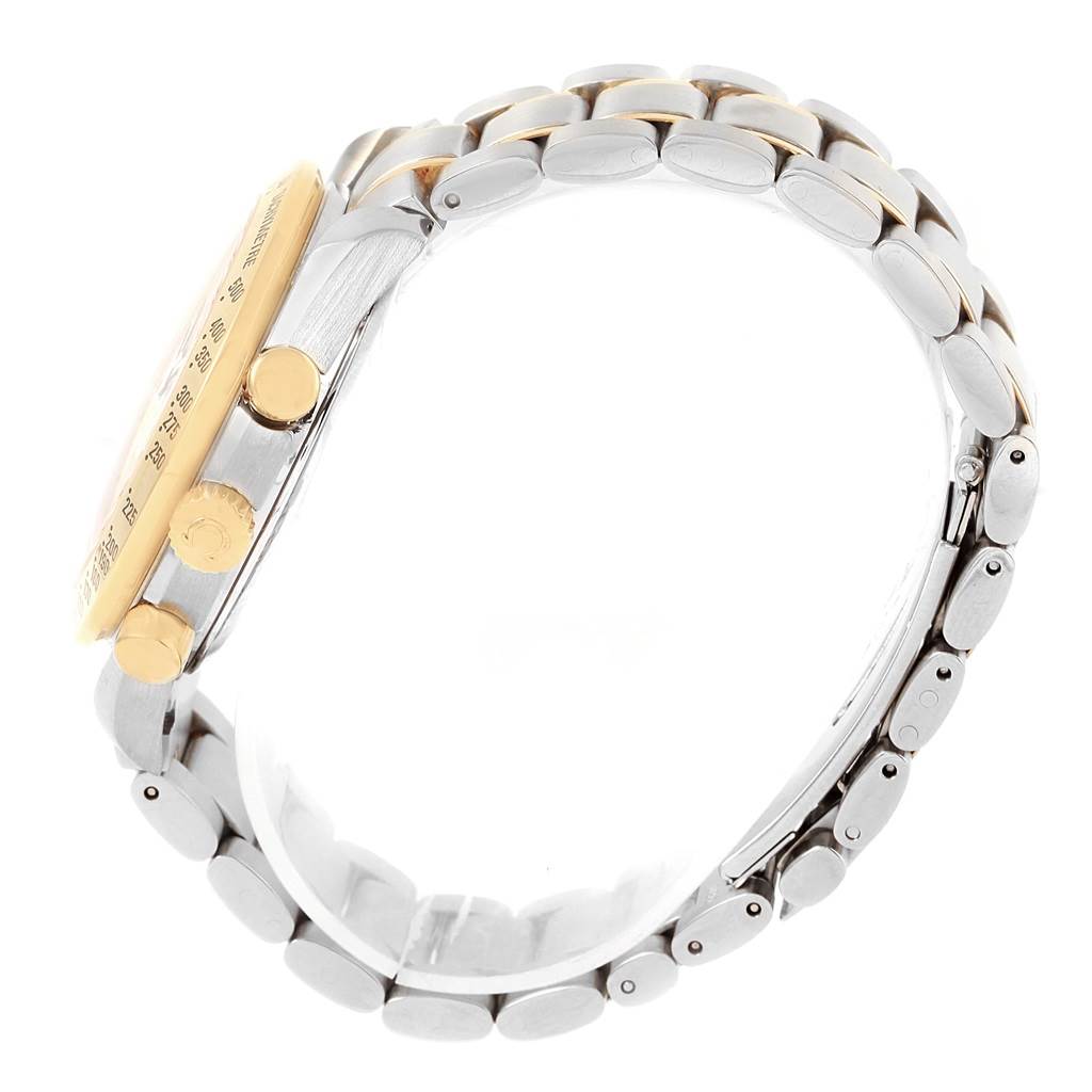 This side view of an Omega Speedmaster 3313.33.00 Men's Steel and Gold (two tone) White Dial 3313.33.00 Men's Steel and Gold (two tone) White Dial shows the casing, pushers, crown, and part of the bracelet.