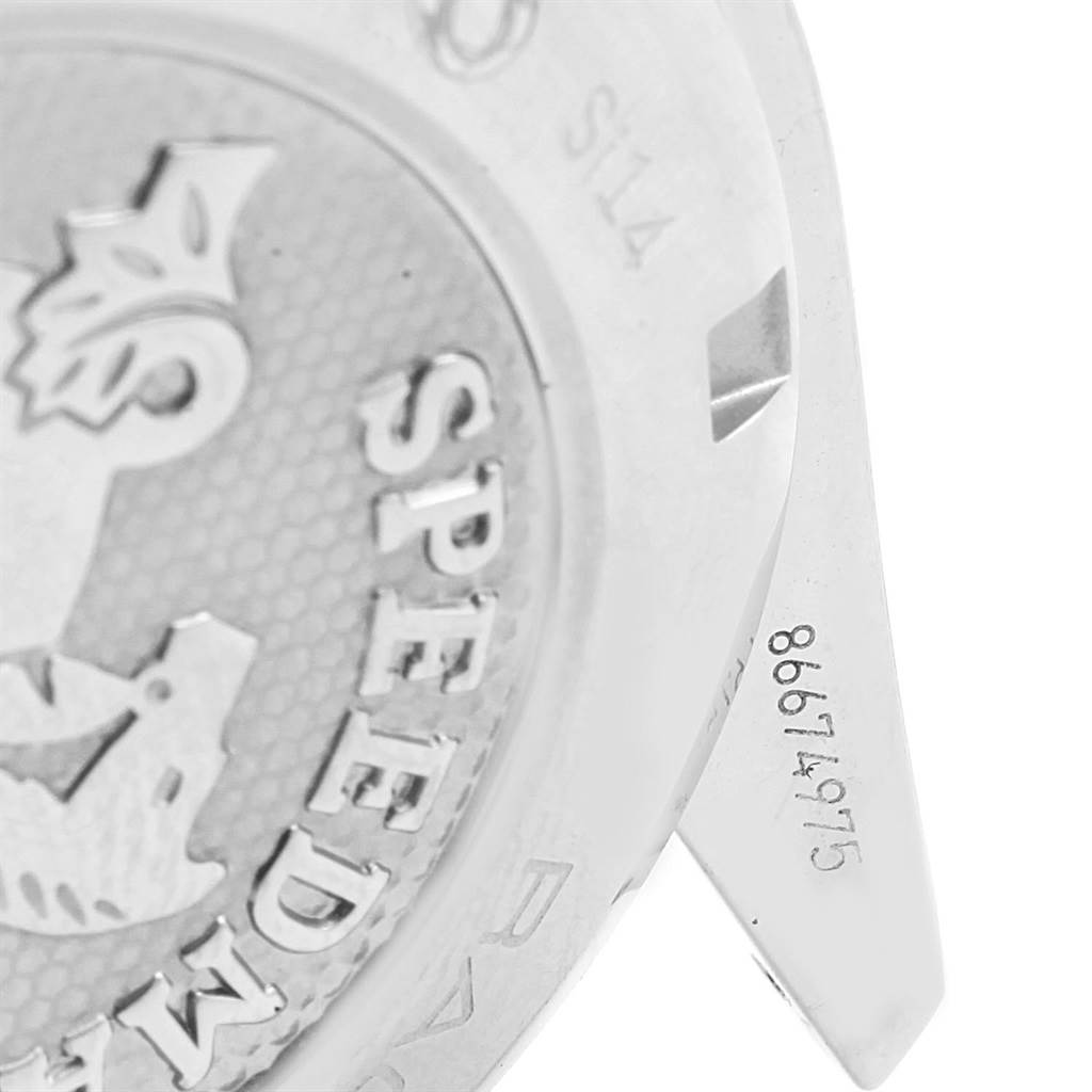 The image shows a close-up view of the back casing of an Omega Speedmaster 326.30.40.50.01.001 Men
s Stainless Steel Black Dial 326.30.40.50.01.001 Men
s Stainless Steel Black Dial watch, highlighting its engraved text and logo.