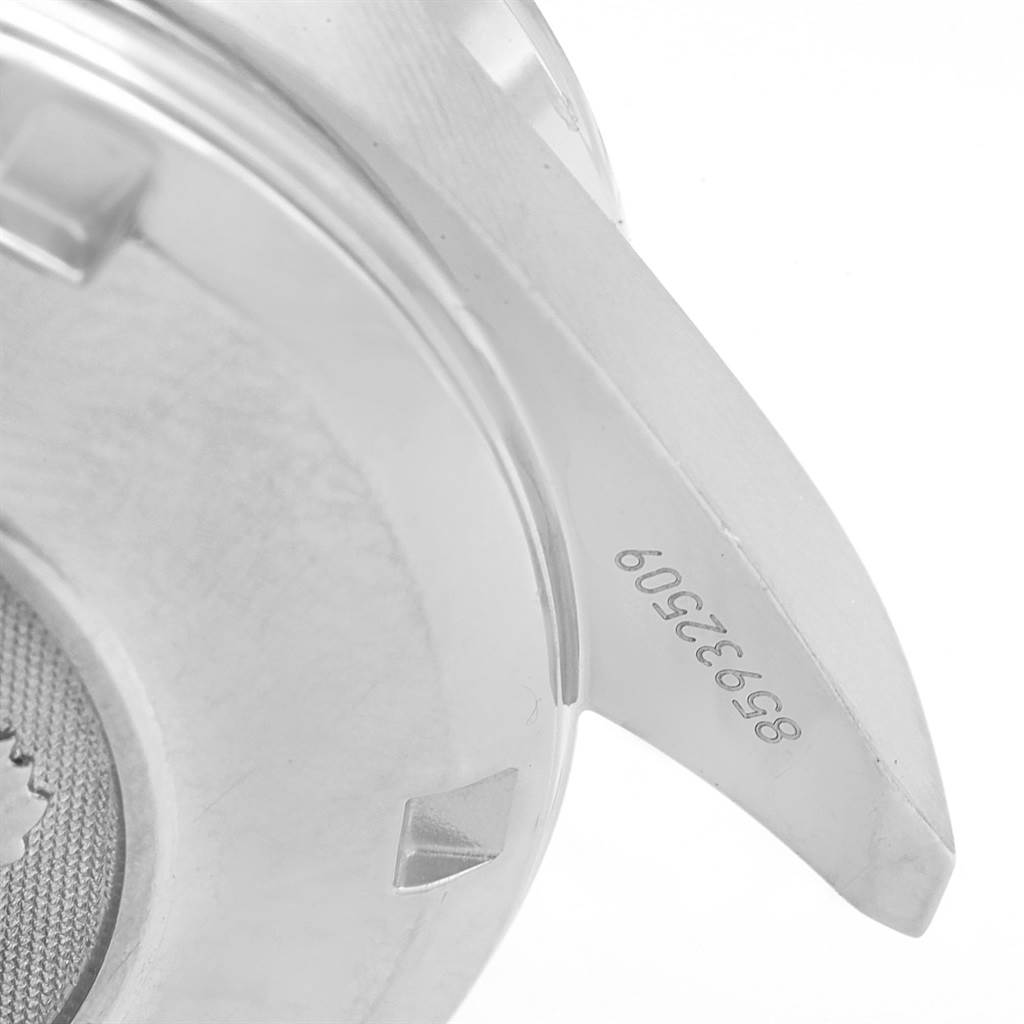 This is a close-up of the case back and lug of an Omega Speedmaster 3220.50.00 Men
s Stainless Steel Black Dial 3220.50.00 Men
s Stainless Steel Black Dial watch, showing part of the serial number.