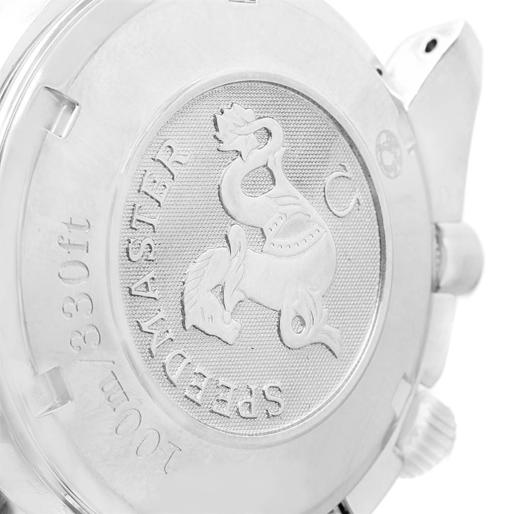 The image shows the case back of an Omega Speedmaster 3220.50.00 Men
s Stainless Steel Black Dial 3220.50.00 Men
s Stainless Steel Black Dial watch with its logo and engravings.