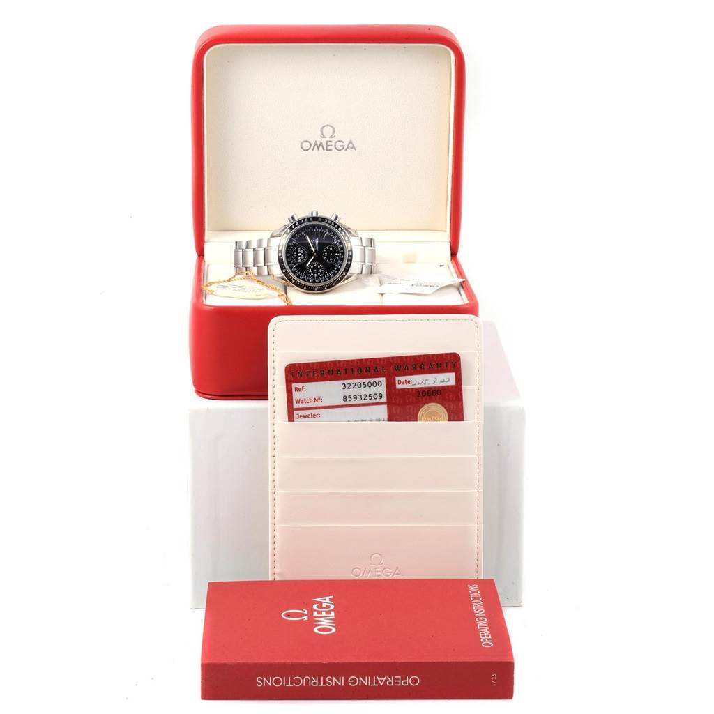 The Omega Speedmaster 3220.50.00 Men
s Stainless Steel Black Dial 3220.50.00 Men
s Stainless Steel Black Dial watch is shown front-facing in its open box, along with documentation and an instruction manual.