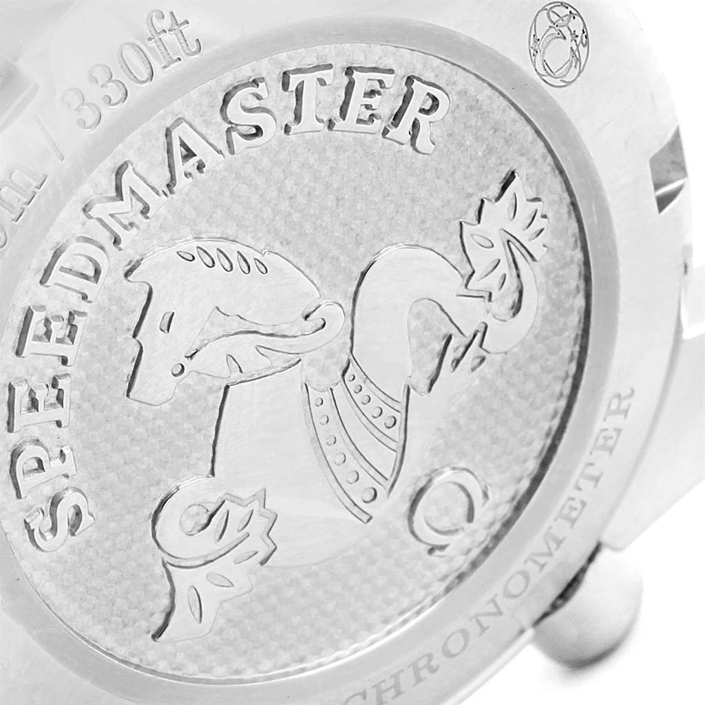 The image shows the engraved case back of an Omega Speedmaster 324.30.38.40.06.001 Men
s Stainless Steel Grey Dial 324.30.38.40.06.001 Men
s Stainless Steel Grey Dial watch, featuring the logo and model name.